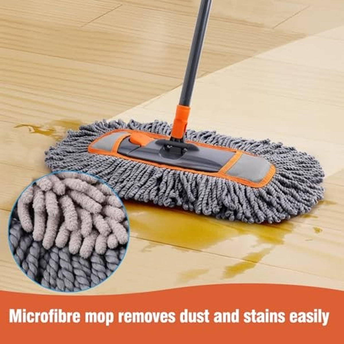 Grey microfiber mop pad with orange frame on wet hardwood for dust and stain lifting