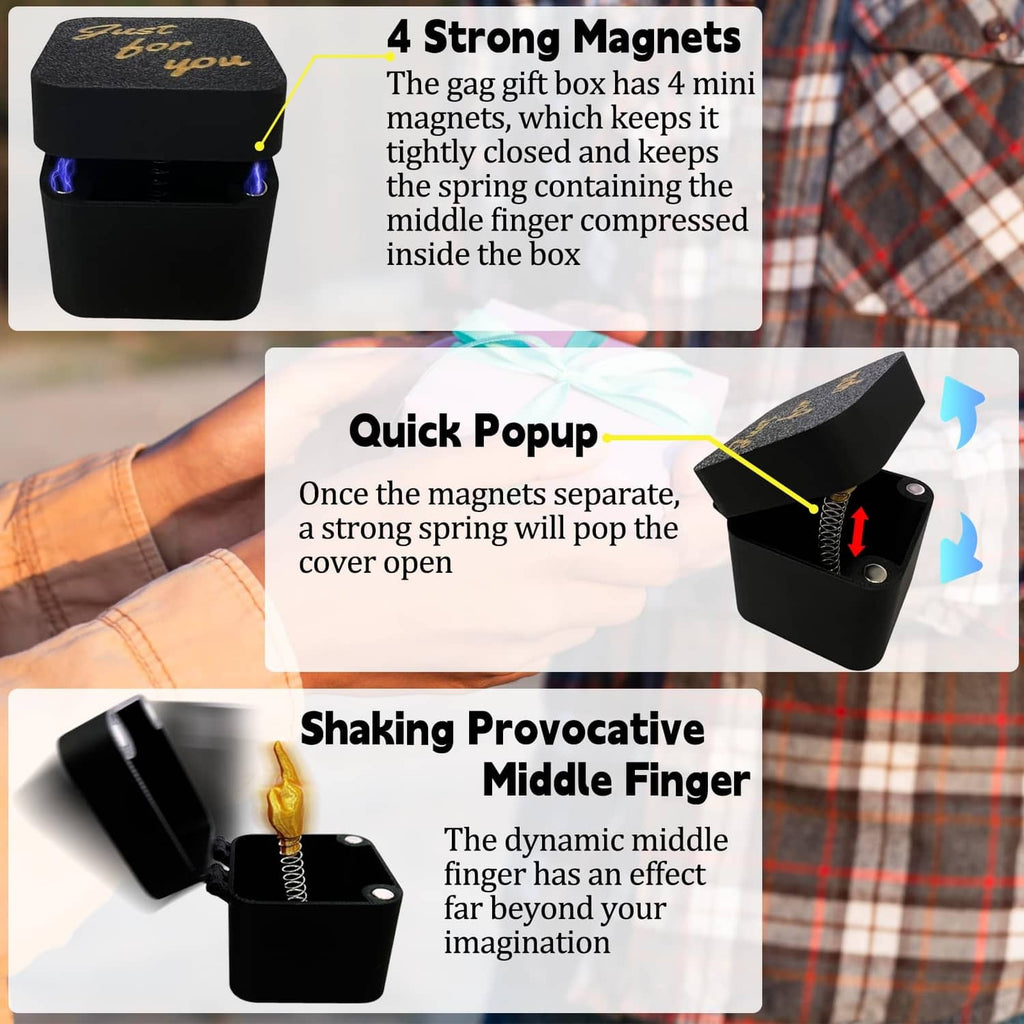 Black open gag gift box with gold middle-finger figure and coiled spring