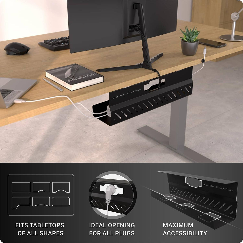Black under-desk cable tray mounted under a desk, organizing plugged-in power cords and cables