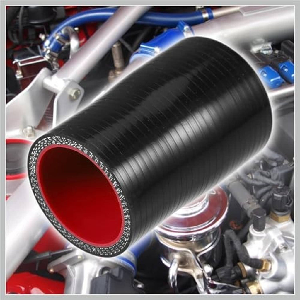 Straight silicone hose coupler mounted in engine bay, black with red interior