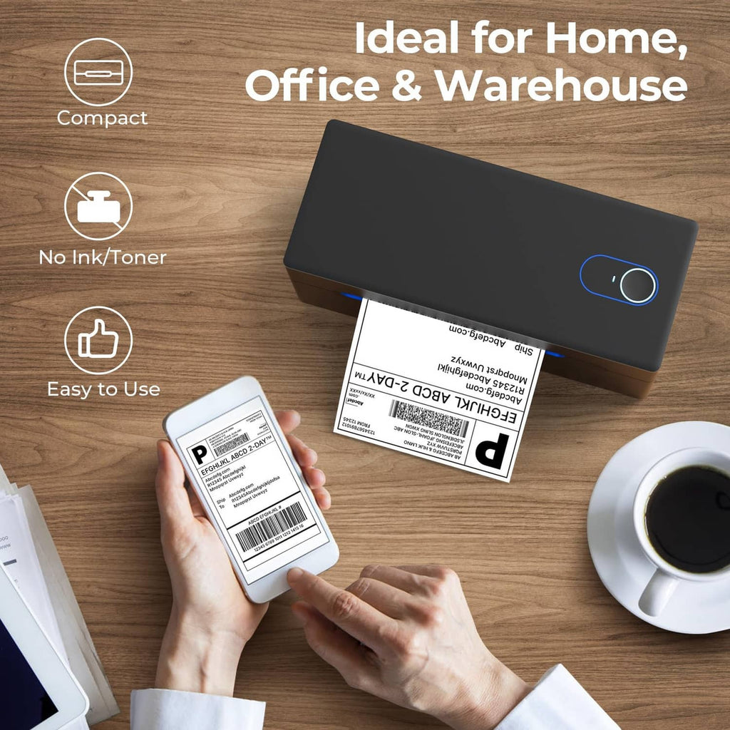 Black thermal label printer on desk with a hand holding a phone label