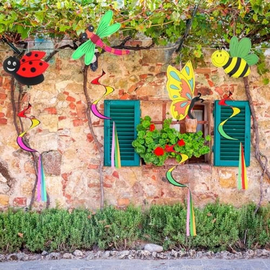 Four garden wind spinners with ladybug, butterfly, dragonfly, and bee figures and hanging ribbons