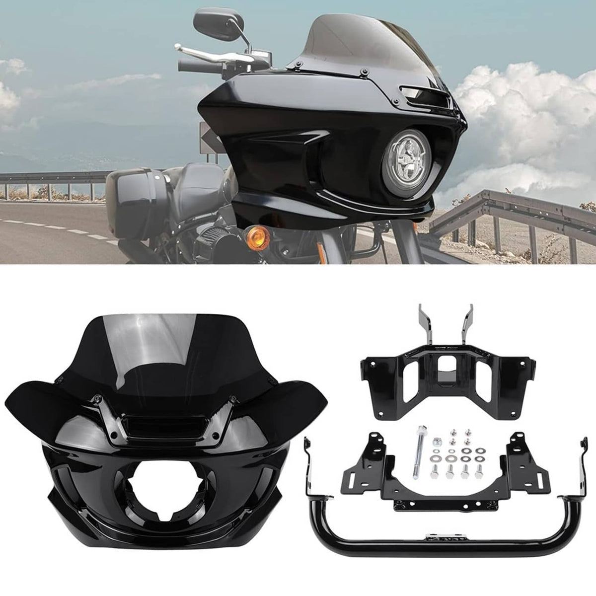 Black headlight fairing with tinted windshield on a touring motorcycle