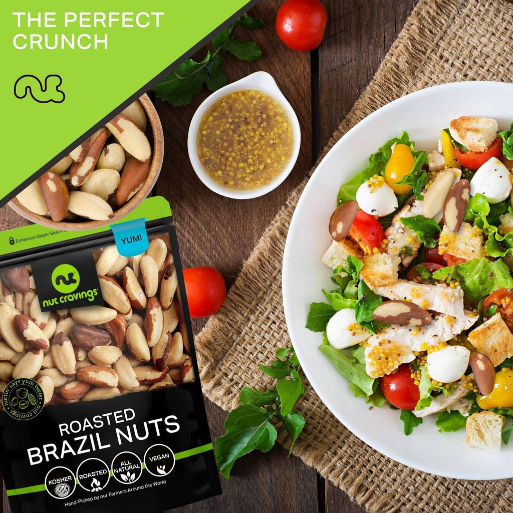 Roasted Brazil nuts pouch beside a salad with tomatoes, greens, and eggs