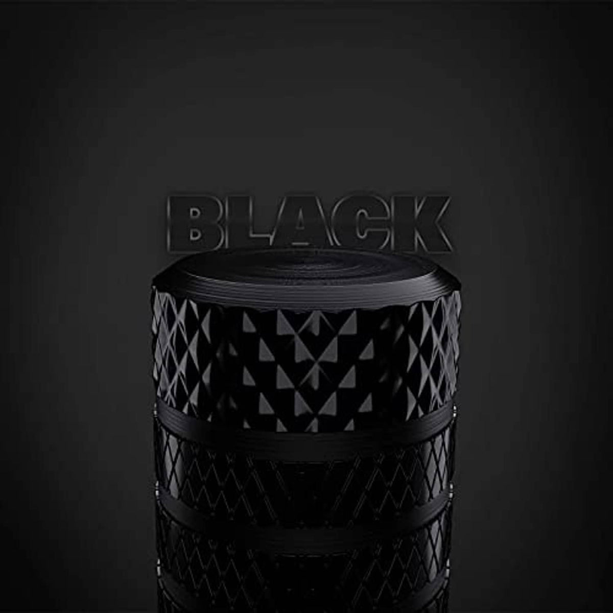 Single black tire valve stem cap with textured diamond grip and flat top