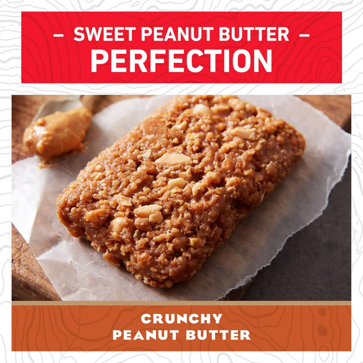 Crunchy peanut butter energy bar with textured coating on parchment