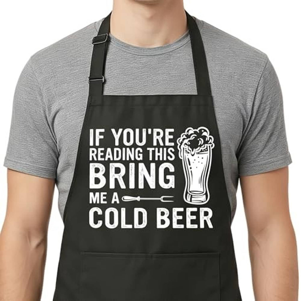 Black BBQ apron over a gray shirt; 'BRING ME A COLD BEER' text with beer mug art