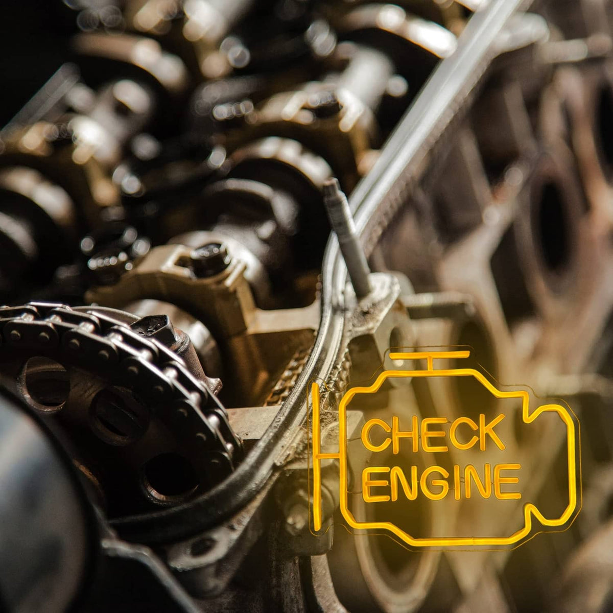 Yellow 'CHECK ENGINE' LED neon sign near engine components.