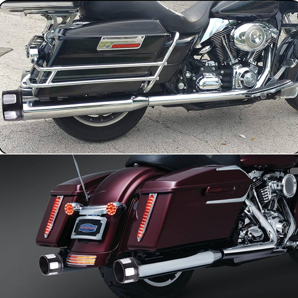 Chrome slip-on mufflers on a touring motorcycle with round black exhaust outlets