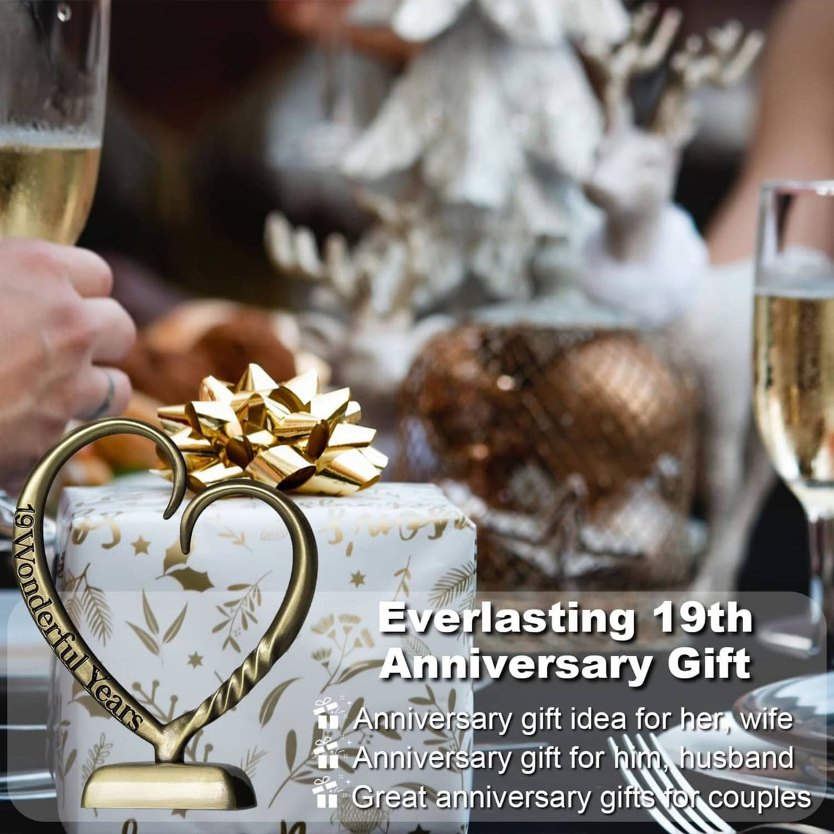 Bronze heart anniversary sculpture with hand-forged look and engraved ribbon