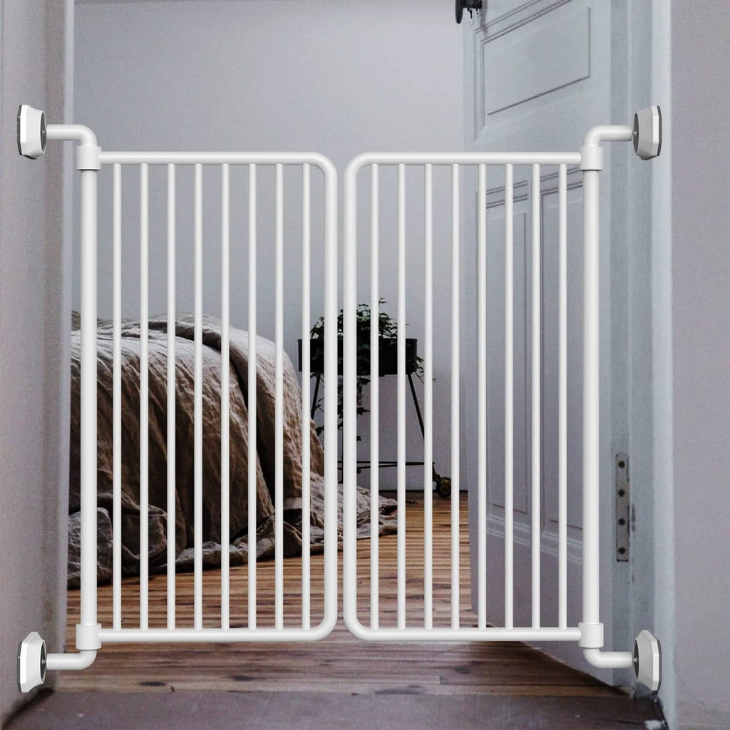 Baby gate installed in doorway with white wall protector brackets on floor-mounted ends