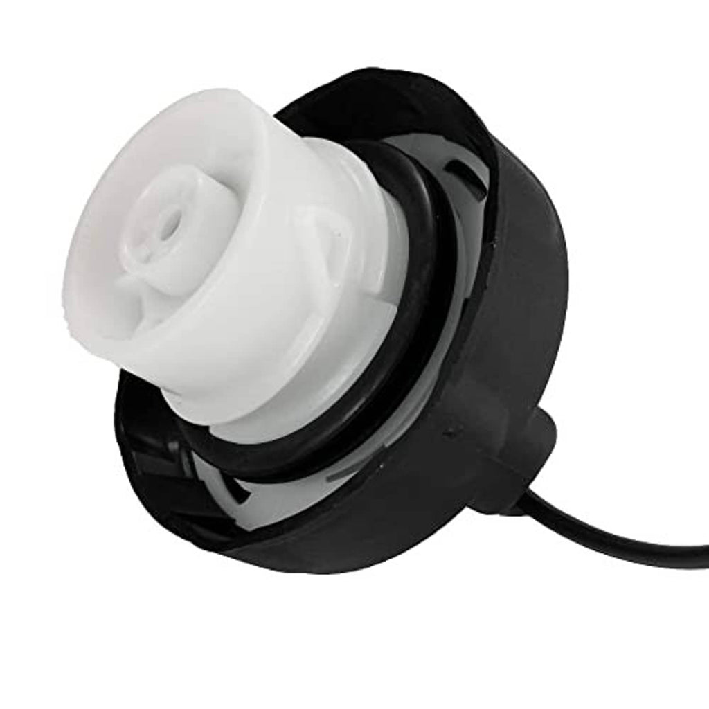 Gas cap tether assembly close-up, white inner cap on black housing with cable
