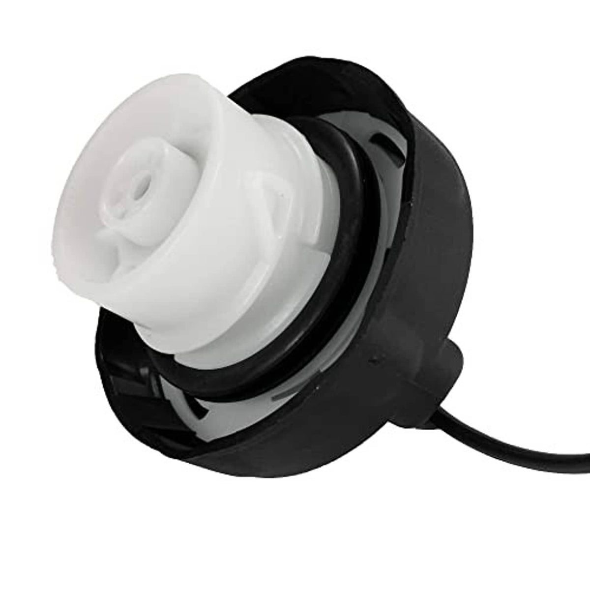 Gas cap tether assembly close-up, white inner cap on black housing with cable