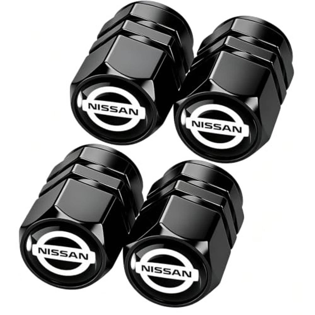 Black metal tire valve stem caps with Nissan logo, faceted hex shape (4-pack)