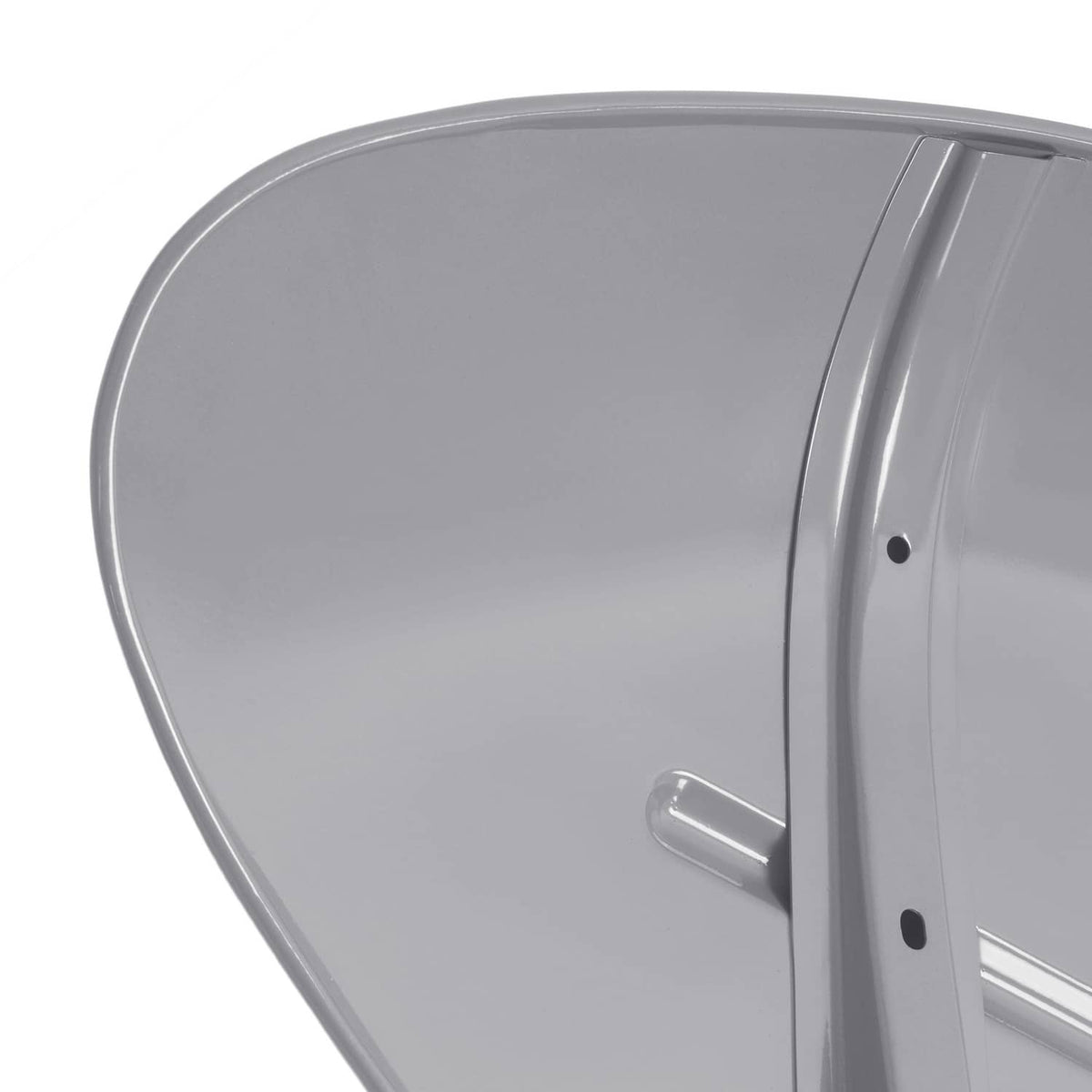 Gray fender skin panel close-up with curved edge, fastener holes, and slot bar