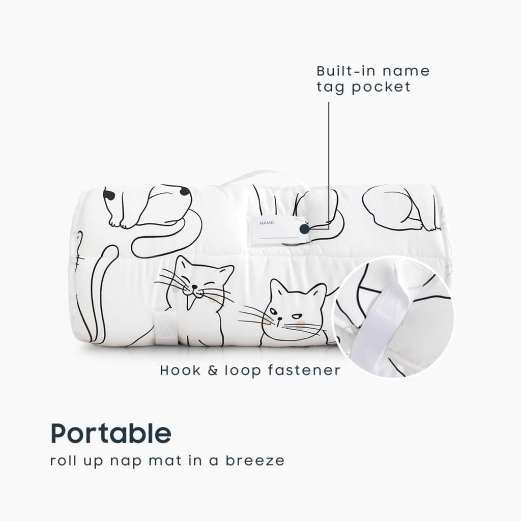 Roll-up toddler nap mat with cat print, built-in tag pocket and hook-and-loop strap