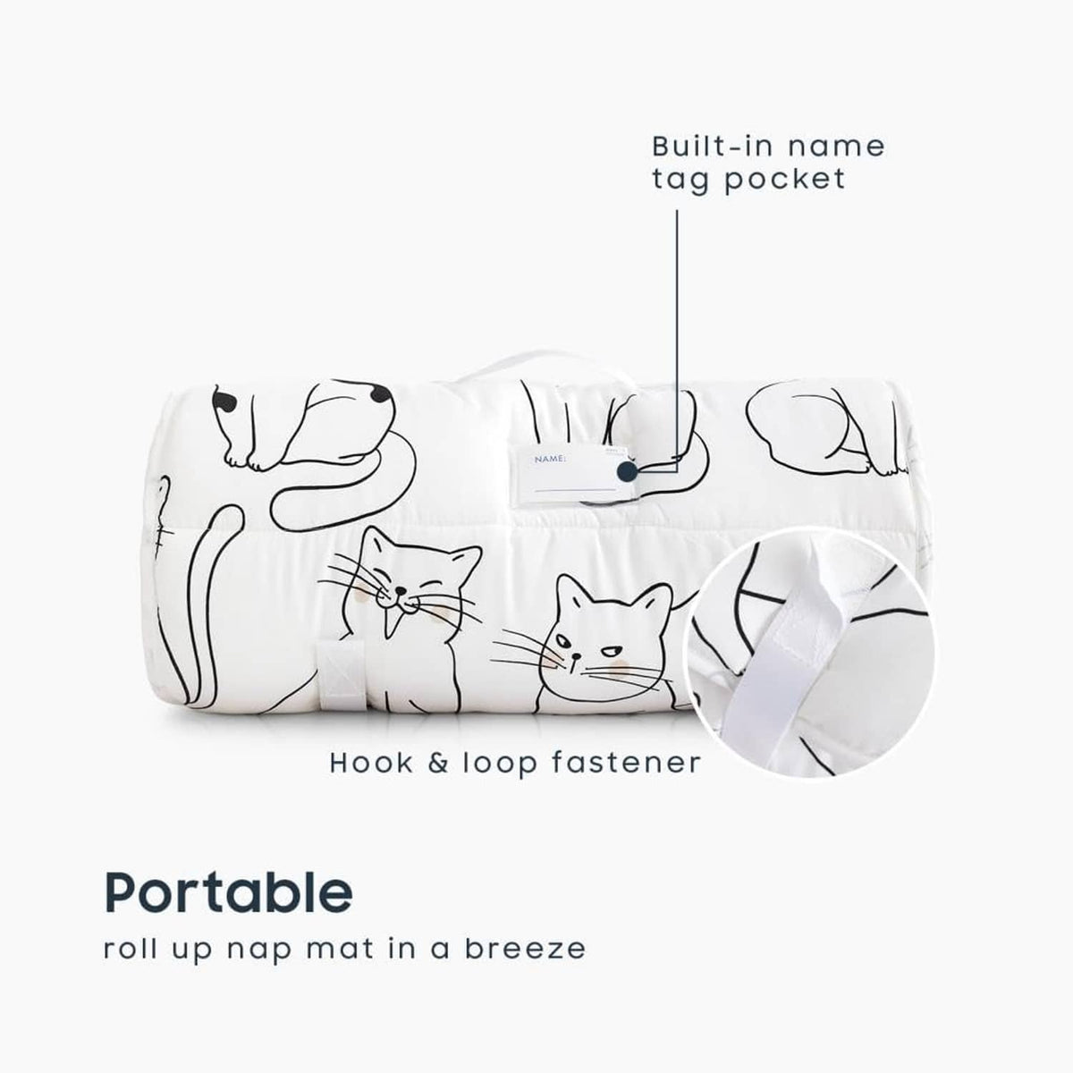 Roll-up toddler nap mat with cat print, built-in tag pocket and hook-and-loop strap