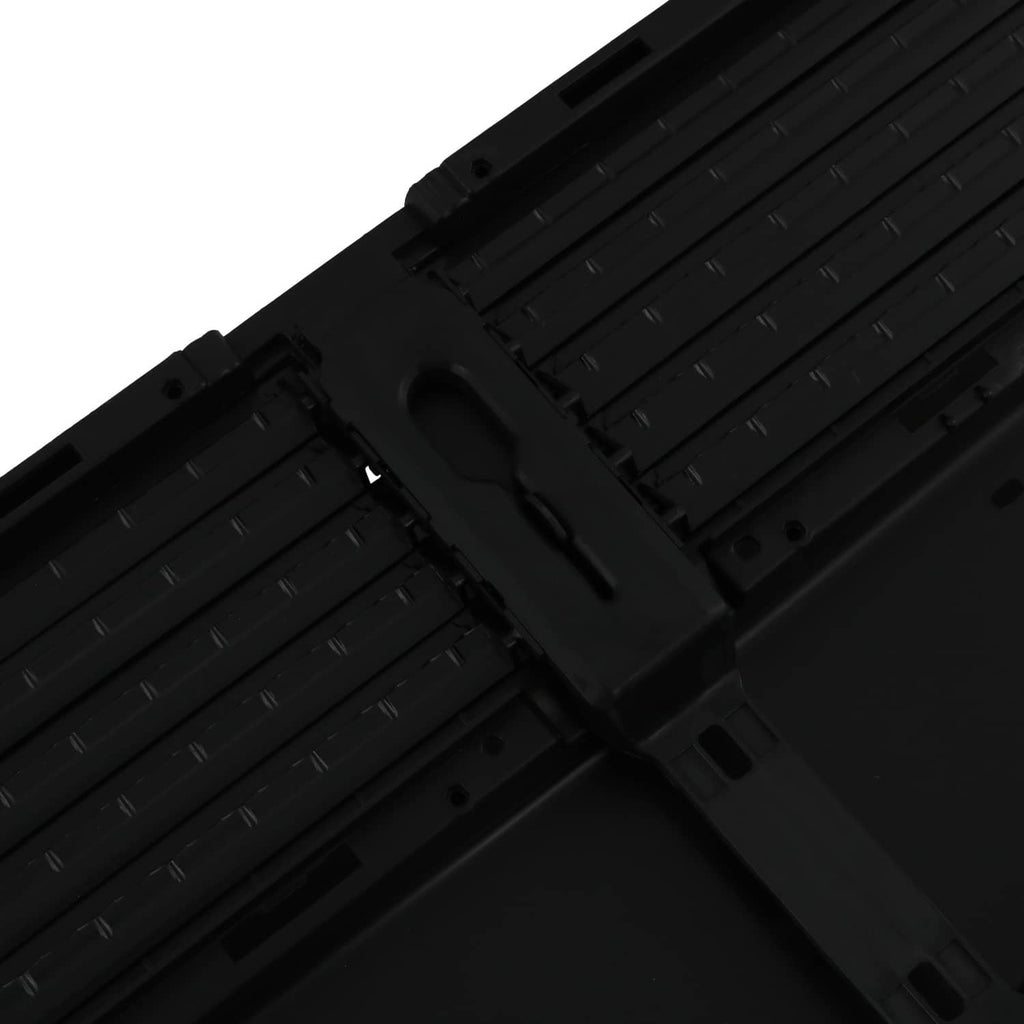 Detail view of black louvered air shutter grille edge and side openings