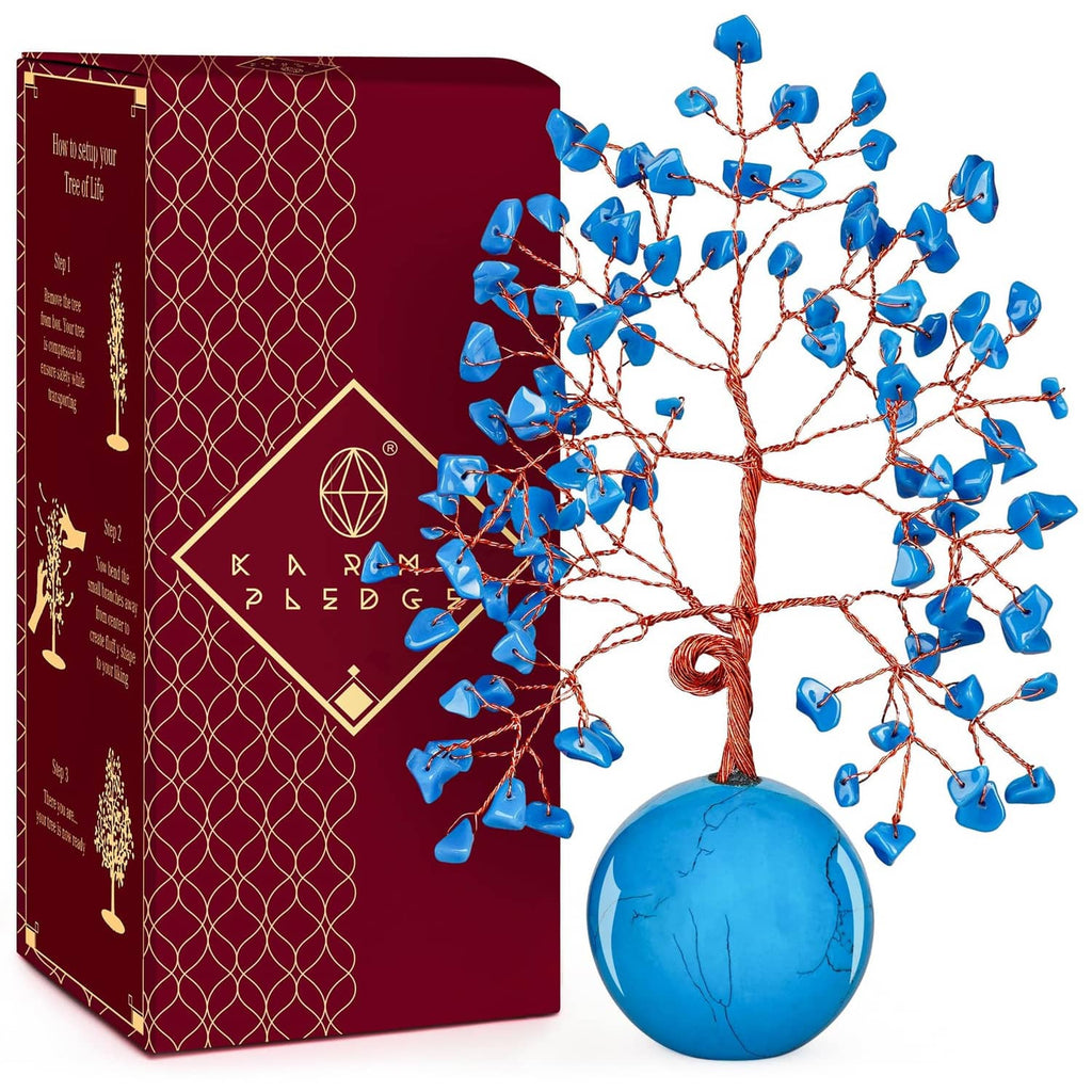 Turquoise ball base Tree of Life ornament with blue petal-like crystals on red wire