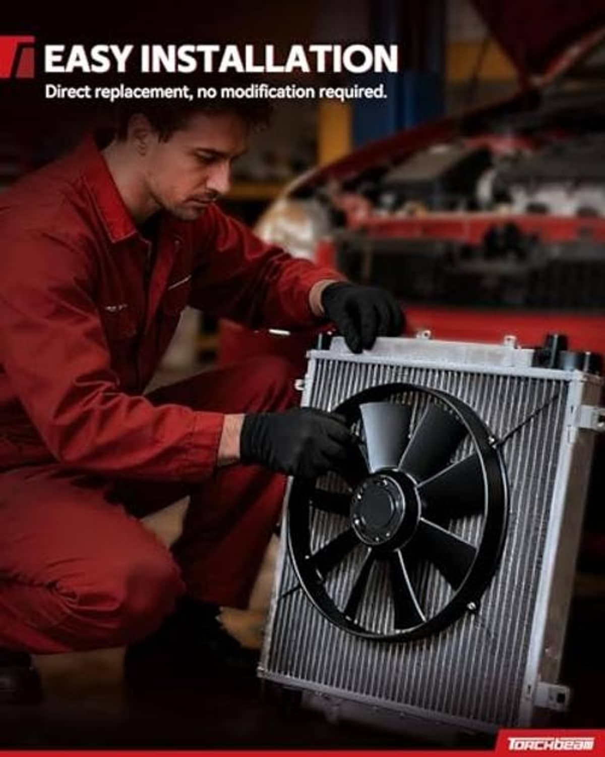 Radiator cooling fan installation with mechanic holding the fan to a radiator