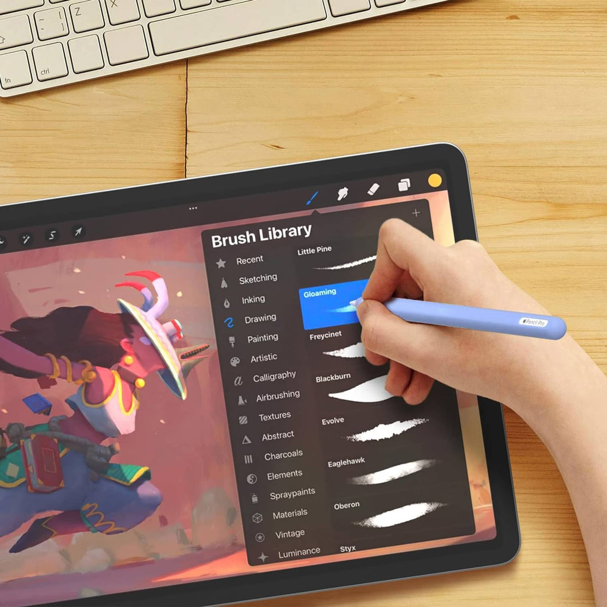 Blue protective silicone stylus cover in use for drawing on a tablet