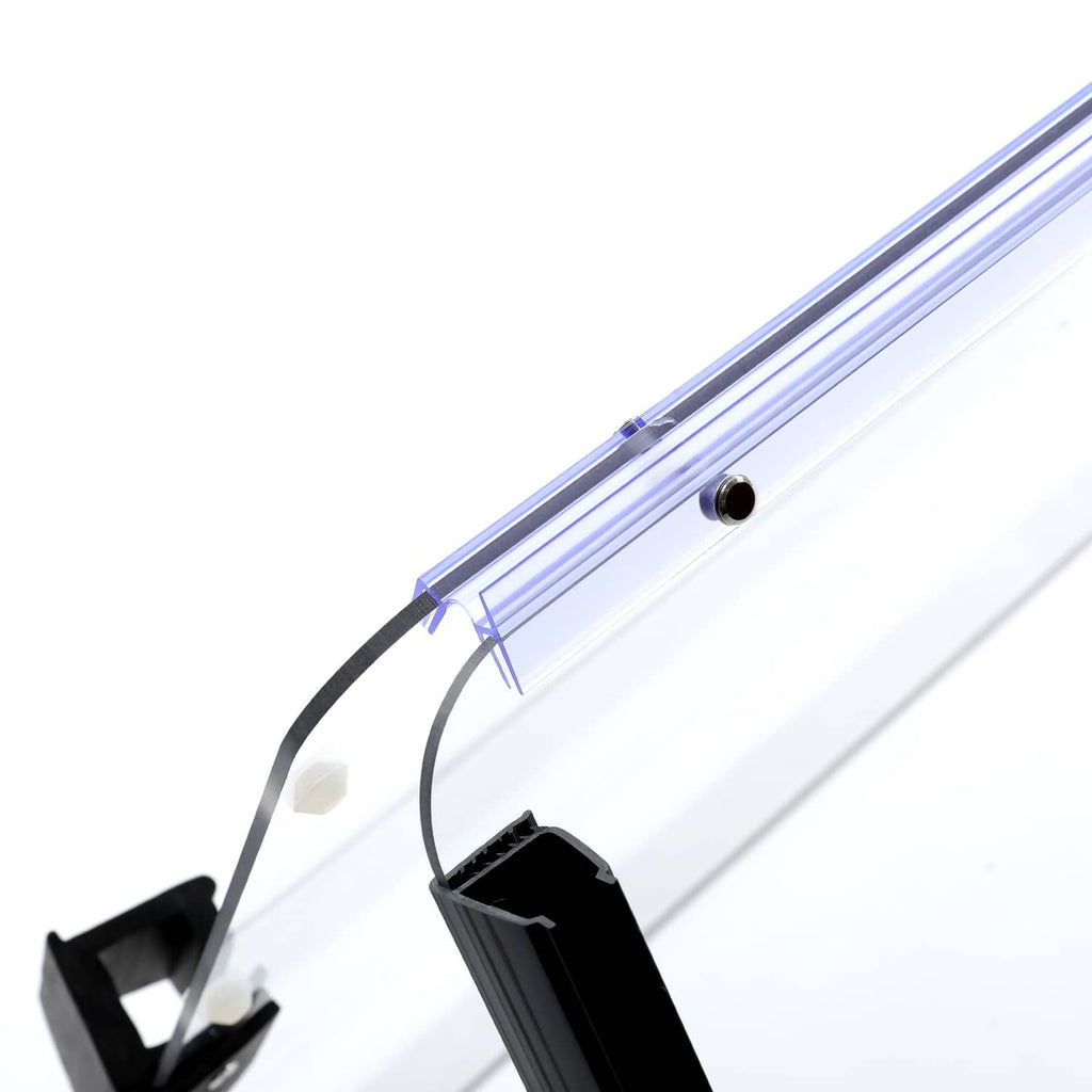 Close-up of clear windshield edge with blue frame rail and mounting hardware