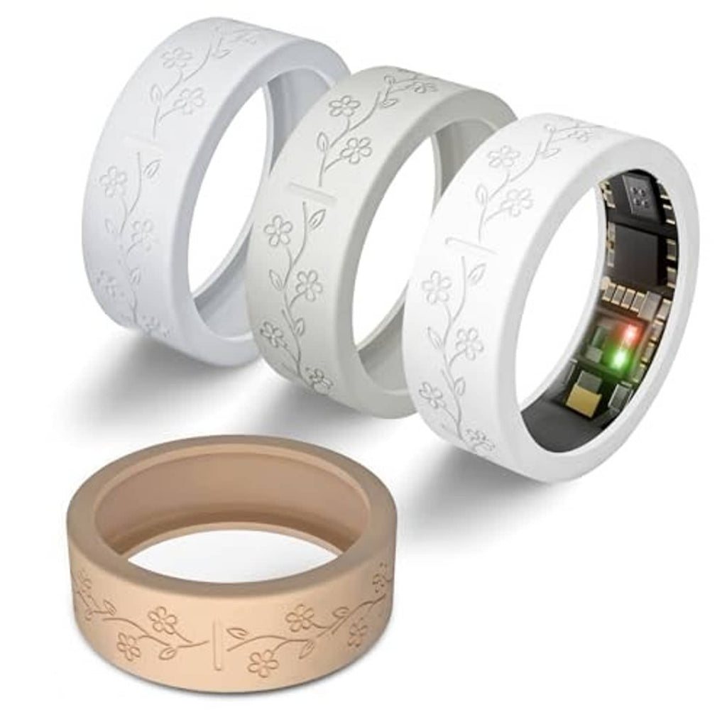Set of floral silicone ring covers in white daisy pattern and one tan cover