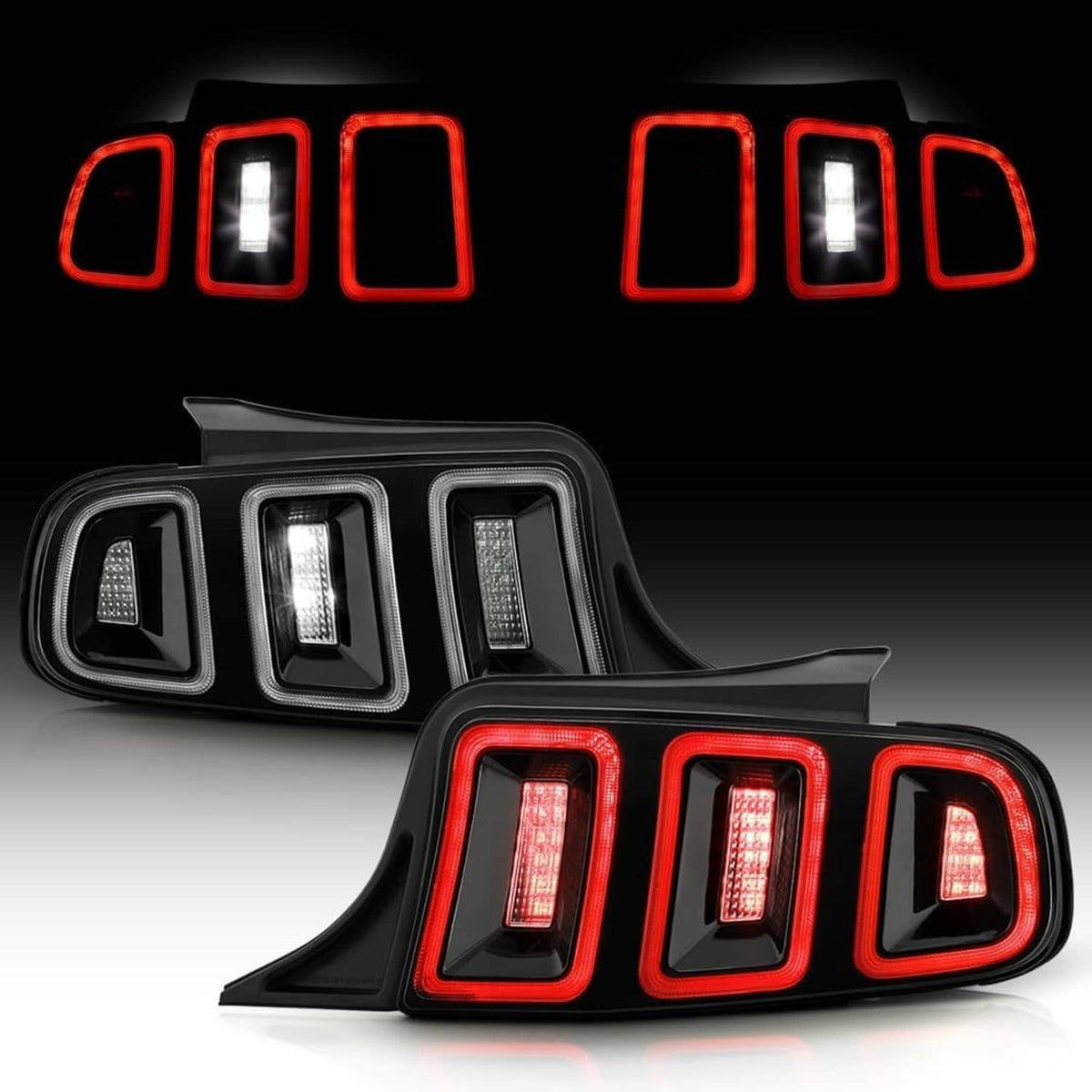 Pair of black LED tail lights with red turn signals and clear reverse light strips