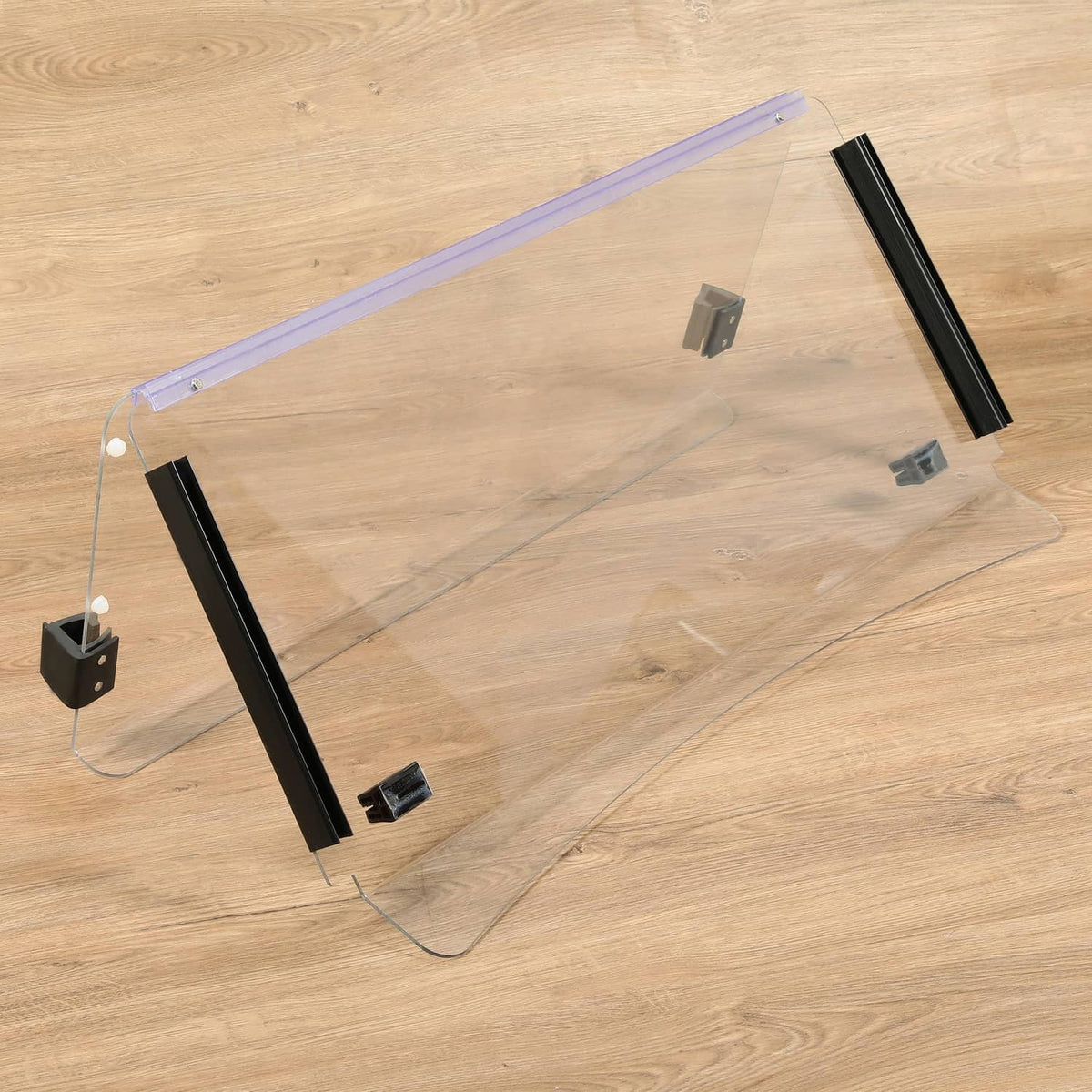 Folding clear windshield assembly with purple strut frame and black end mounting blocks