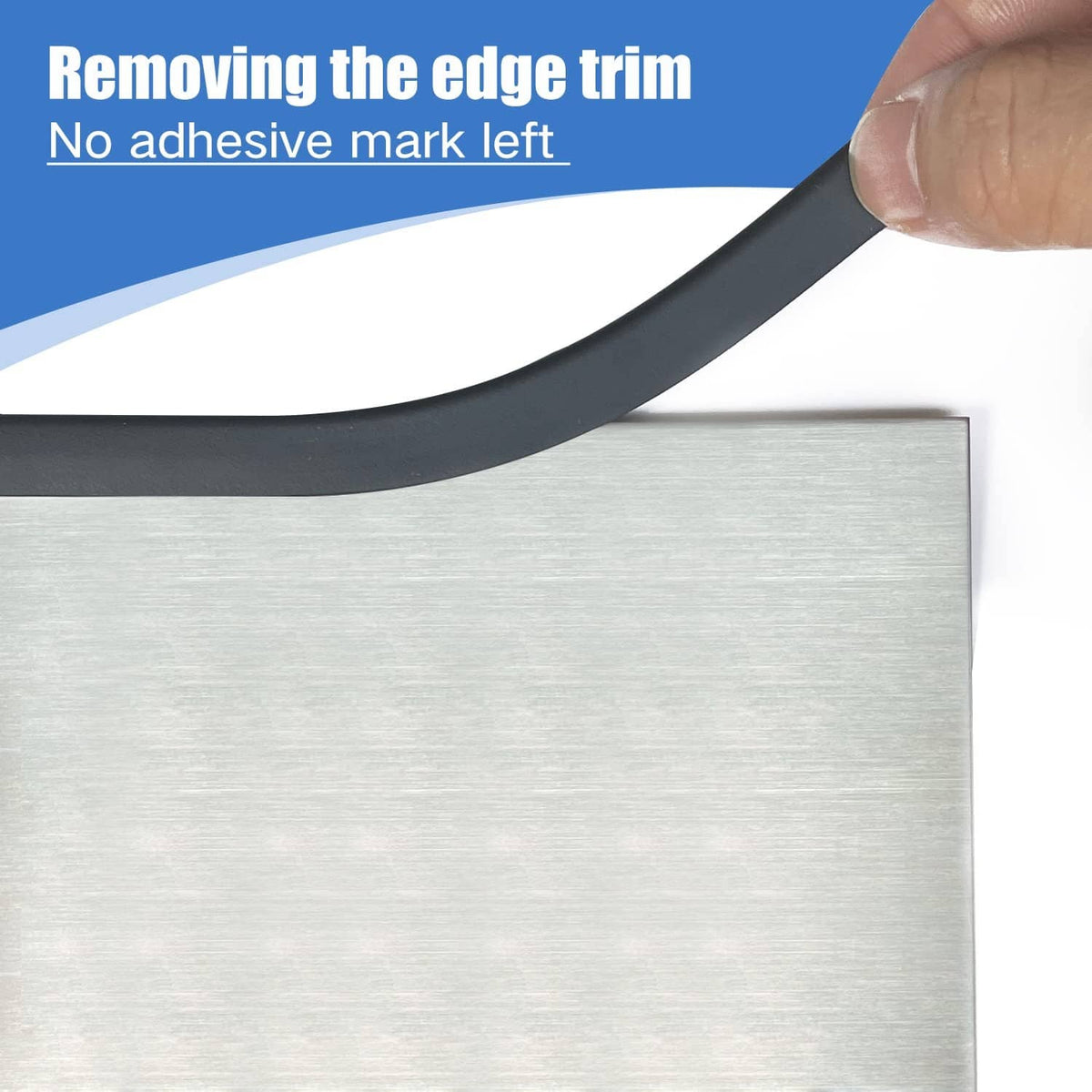 Black rubber edge trim strip being peeled from metal edge, showing red inner