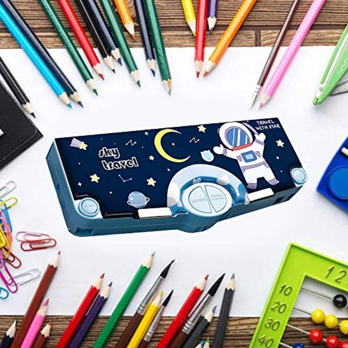 Space-themed multifunction pencil case with blue open compartments and organizer tray