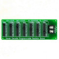 Green seven-decade programmable resistor board with terminal block and printed resistor values