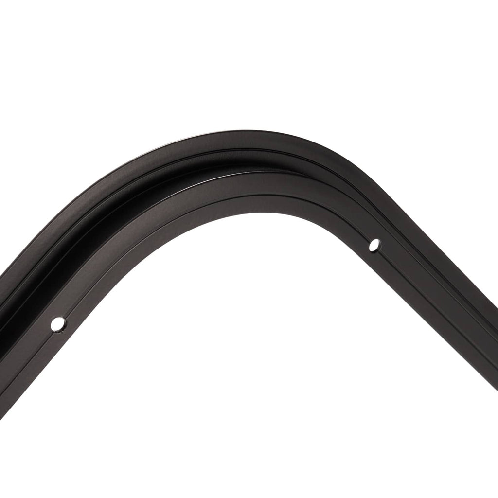 Rounded corner trim of a dark RV window horizontal slider with small mounting holes