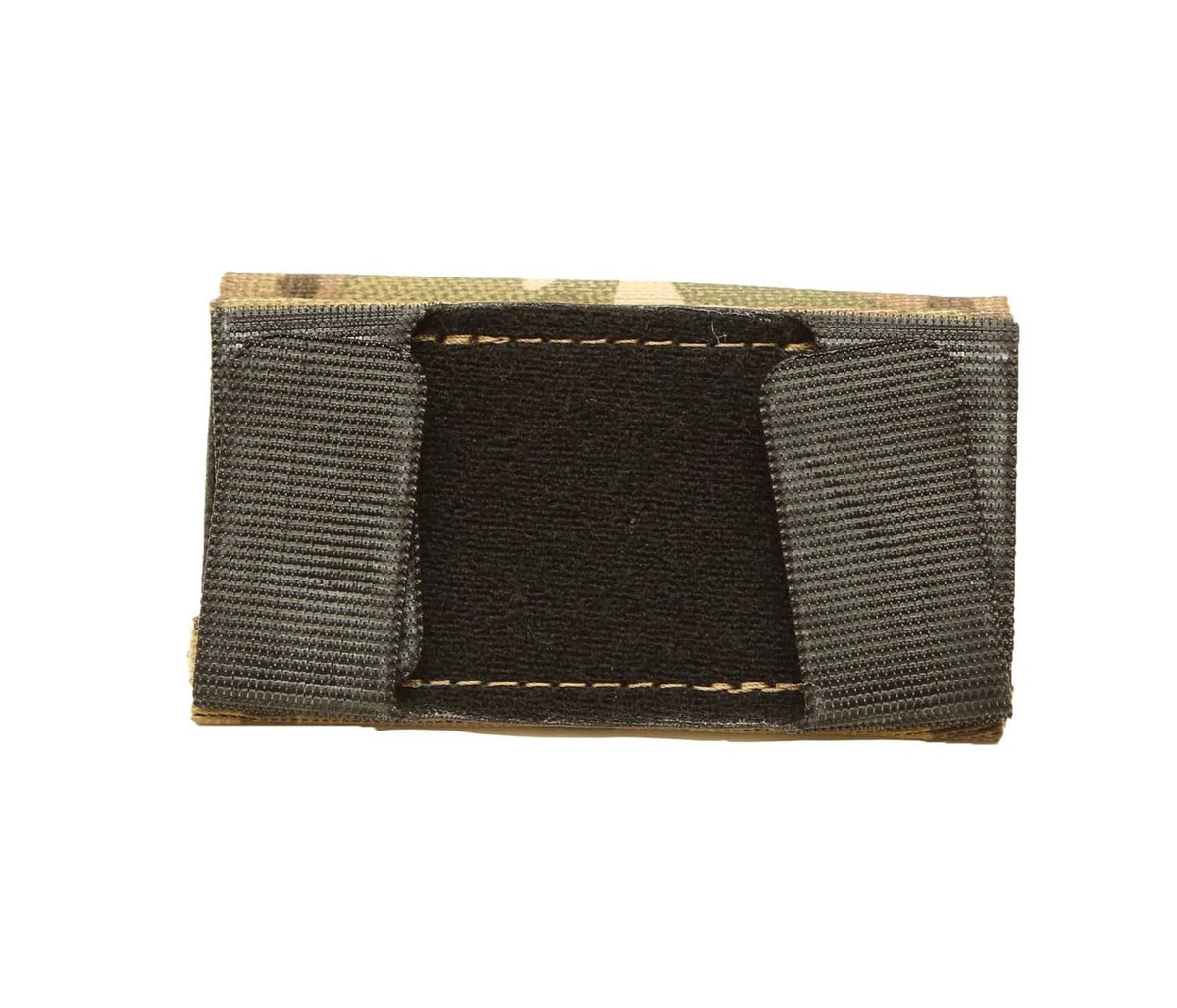 Elastic tourniquet pouch with black interior panel and black webbing side panels