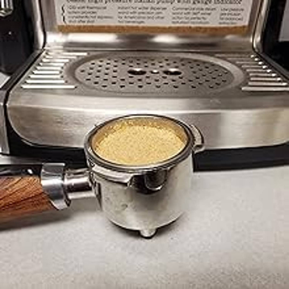 Espresso machine with a portafilter holding light coffee grounds