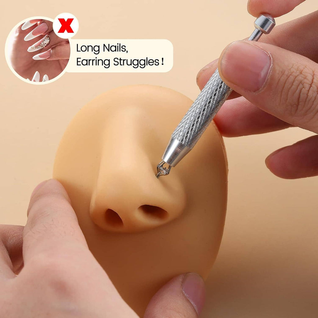 Piercing ball grabber tool inserting a stud through a model nose stud hole