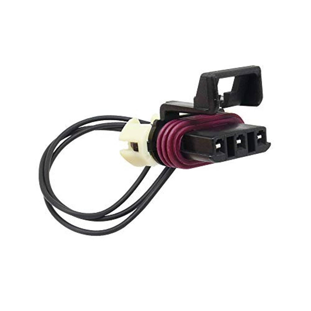Engine camshaft sensor connector with maroon insert, black terminal block, and wire harness