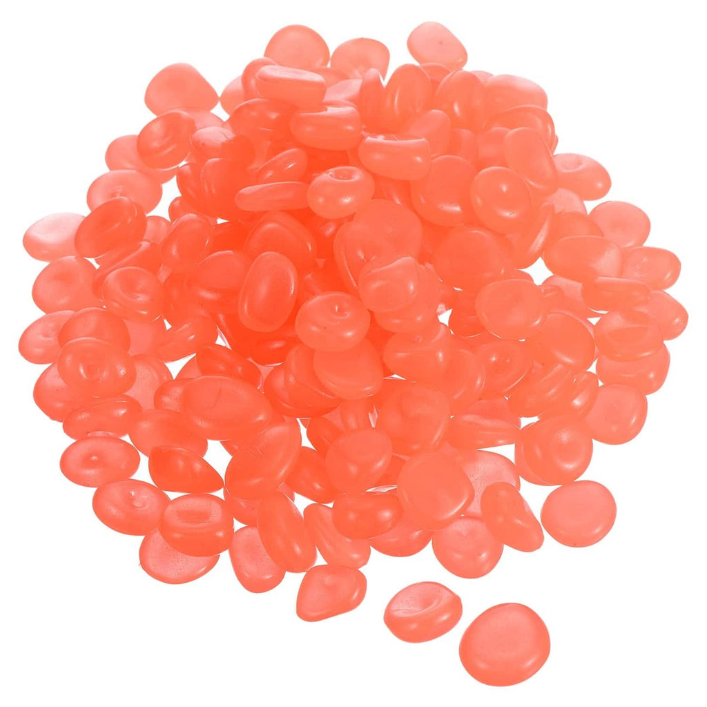 Orange glow rocks pebbles, resin, assorted oval stones pile for decoration