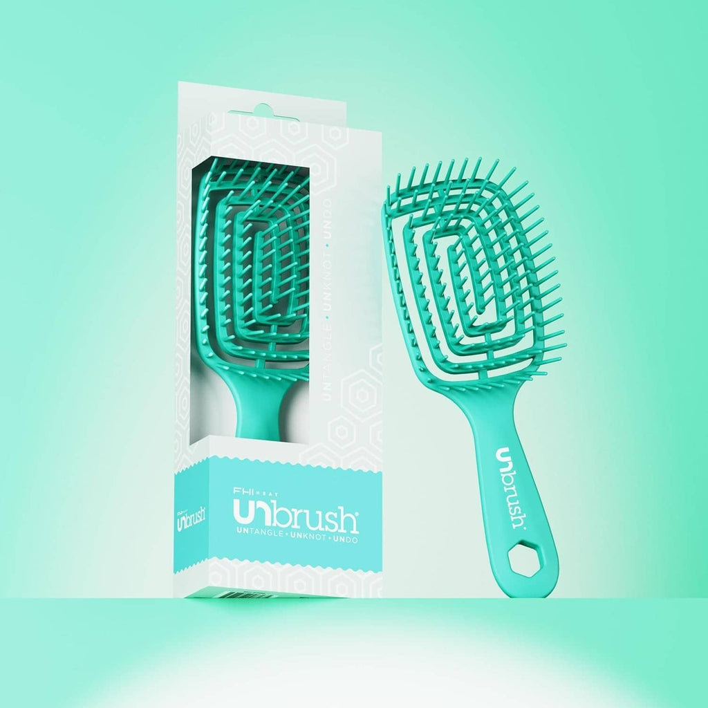 Teal detangling hairbrush beside boxed packaging, flex bristle head and grip handle