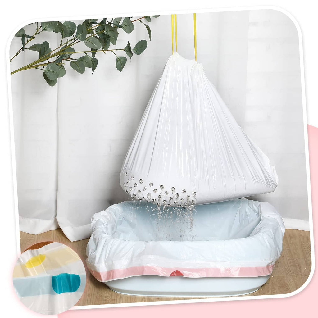 Hanging white sifting cat litter liner bag with perforated filter holes over tray