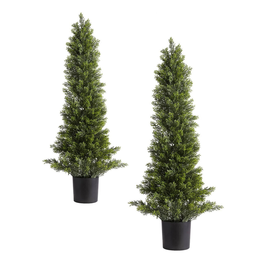 Two artificial cedar topiary trees with green needles in dark plastic pots