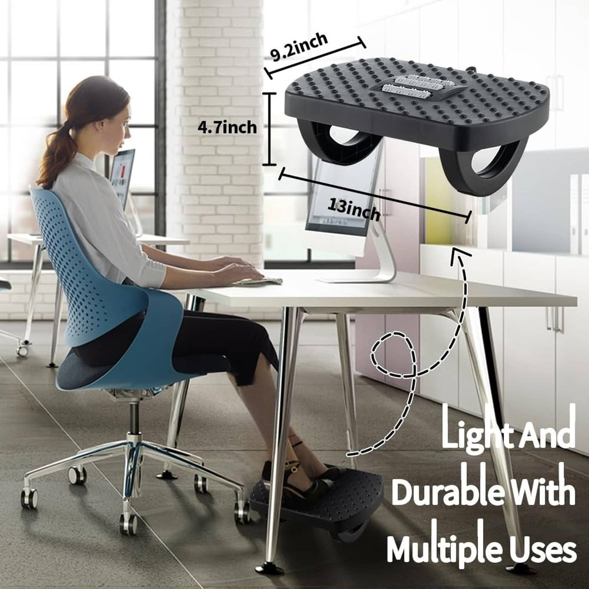 Black under-desk footrest with triple-curve frame and textured massage platform