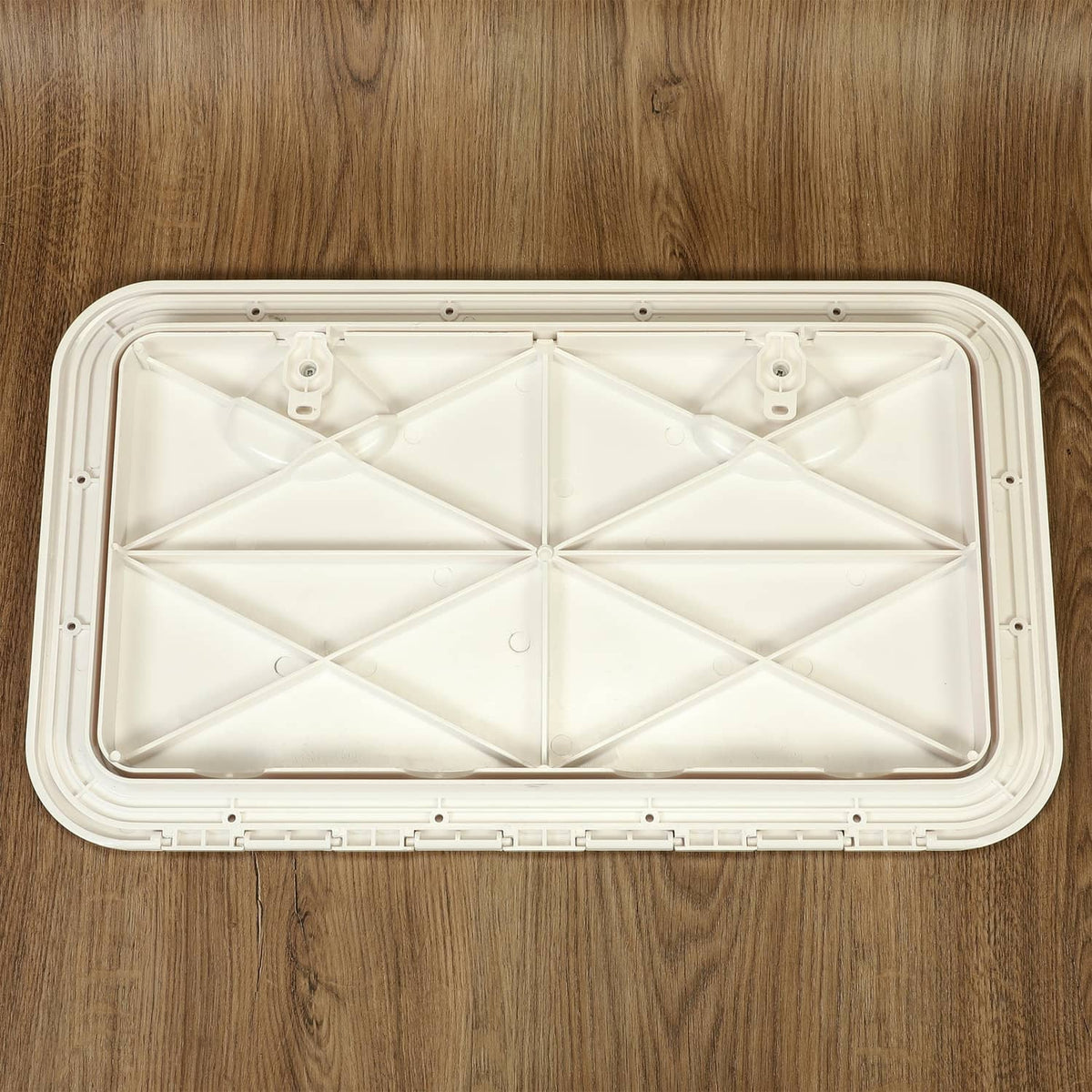 White marine hatch lid open flat view with cross-brace ribs and corner mounts