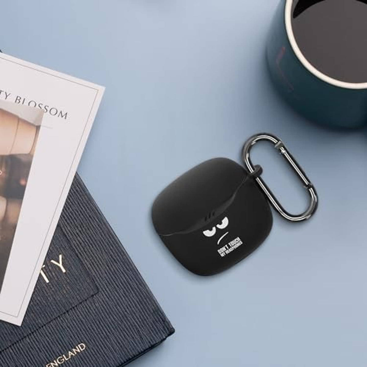 Black silicone earbuds case cover with carabiner hook and face graphic