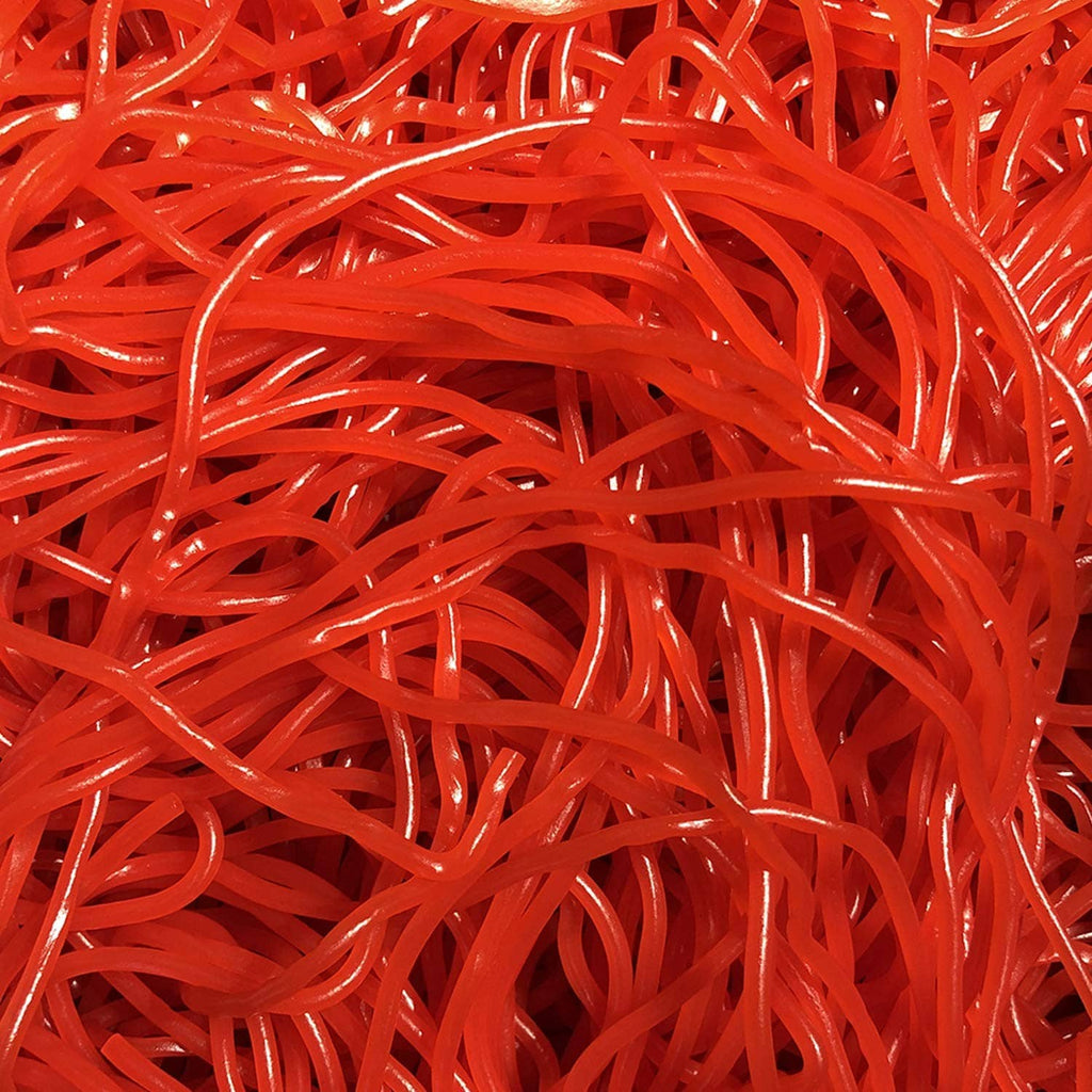 Close-up of red string licorice strands