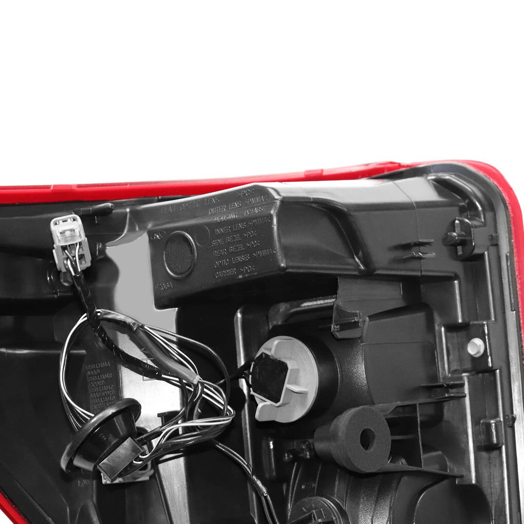 Left tail light inner housing with wiring, connectors, and mounting hardware