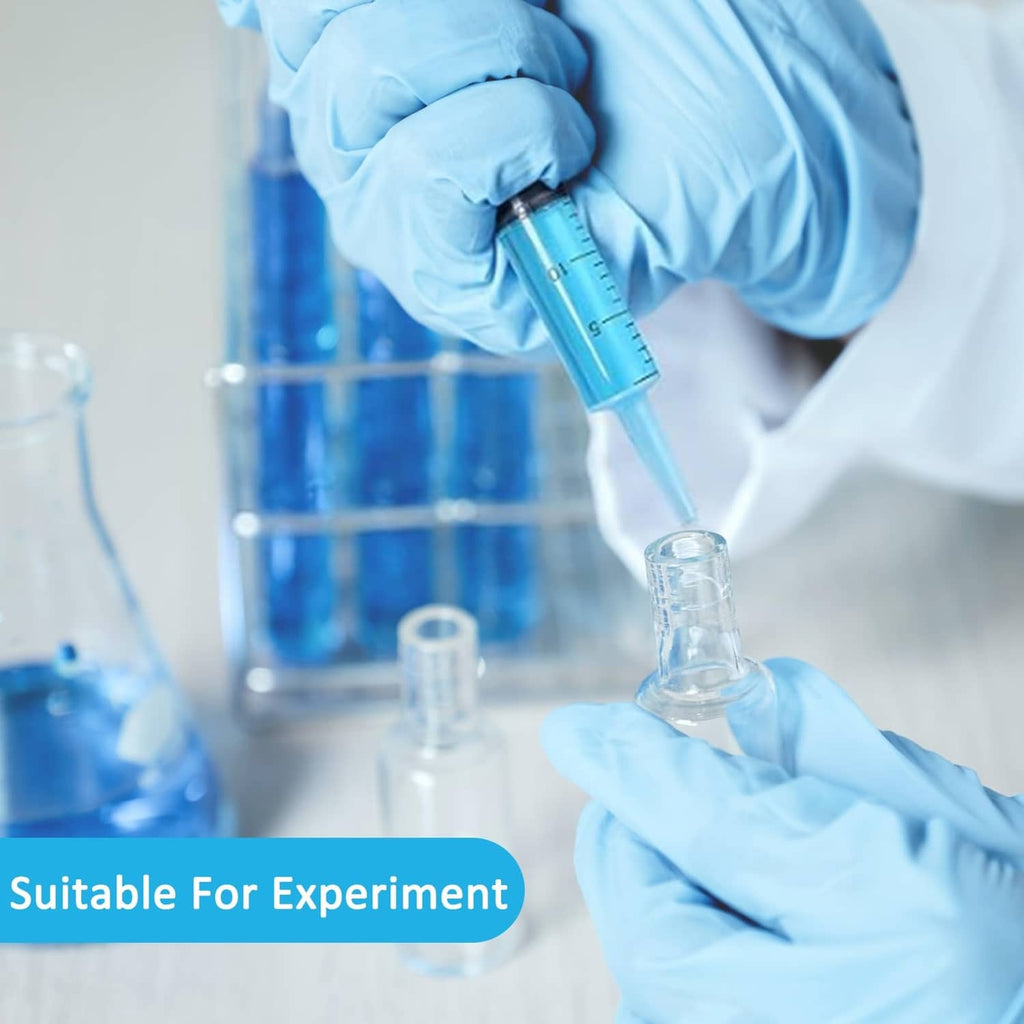 60 ml plastic syringe with cap, clear barrel held by gloved hands