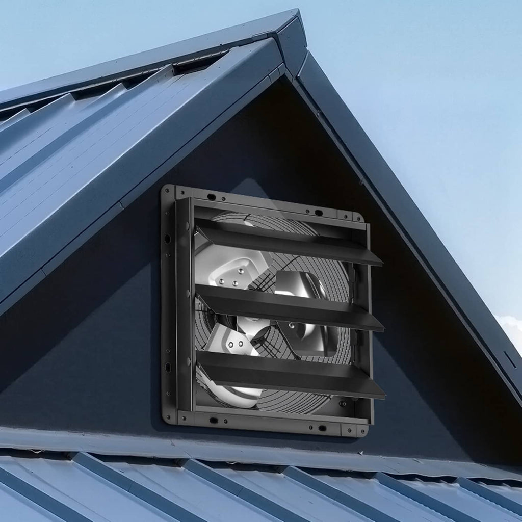 Wall-mounted exhaust fan installed under roof eave with louvered front opening