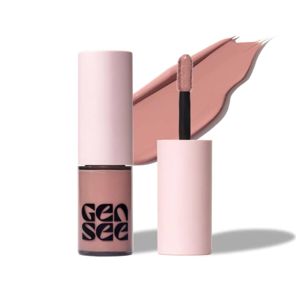 Rose water matte liquid eyeshadow in bottle form with applicator holding a creamy swatch.