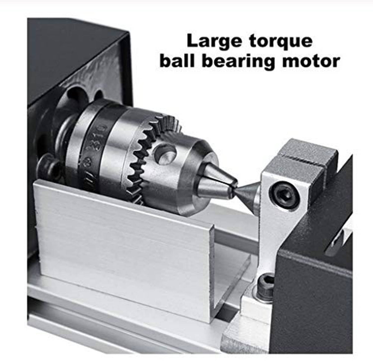 Wood lathe headstock detail with silver spindle gear and black motor housing